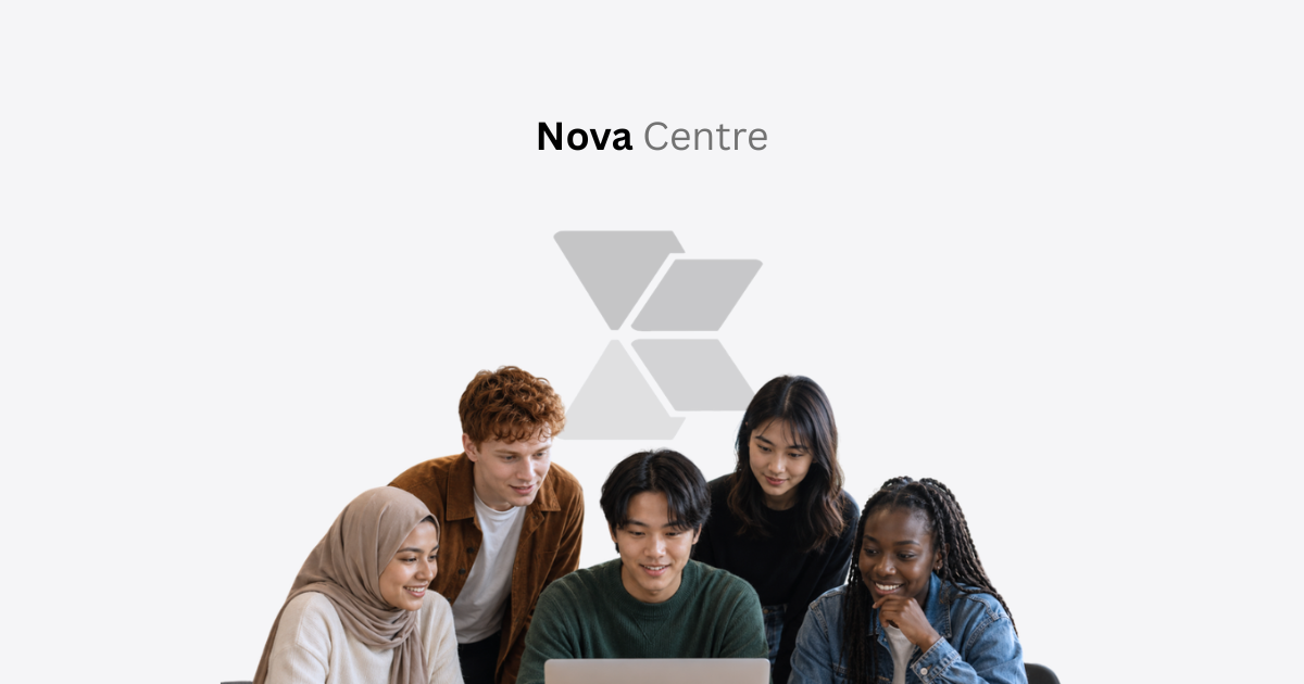 A group of learners gathered around a laptop at Nova Centre