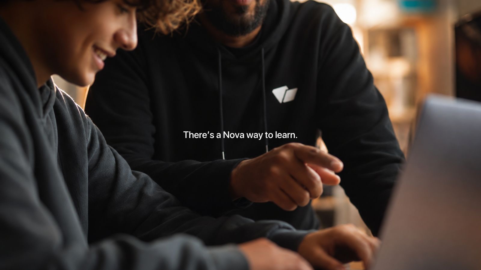 A tutor guiding a learner. There’s a Nova way to learn.